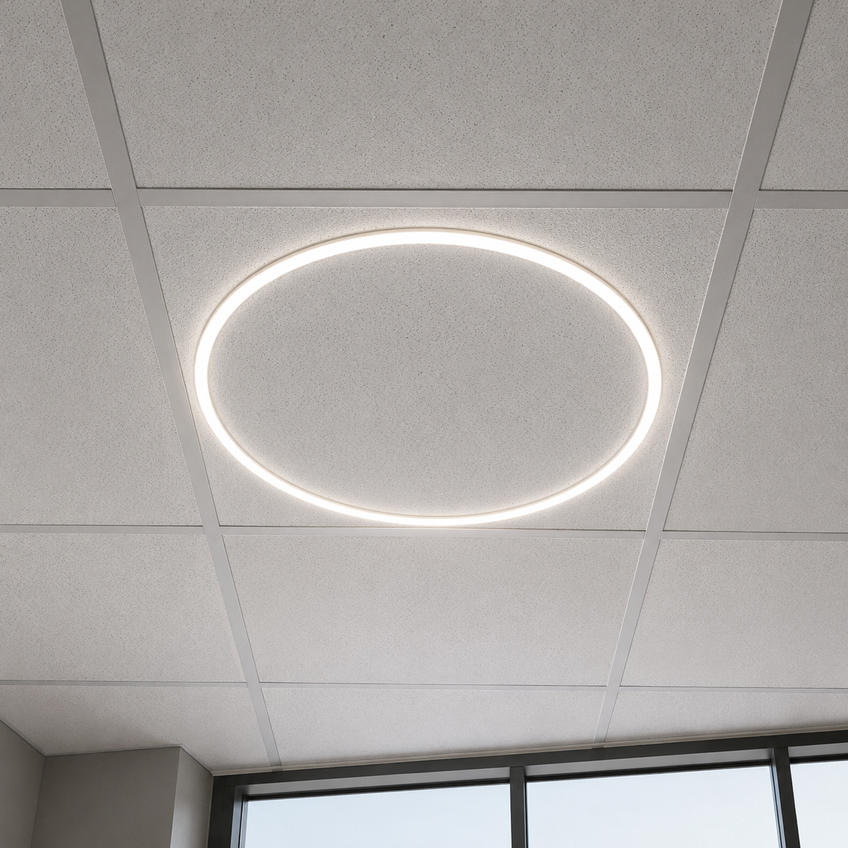 Kanlux AVAR O round LED ceiling light illuminated in suspended ceiling